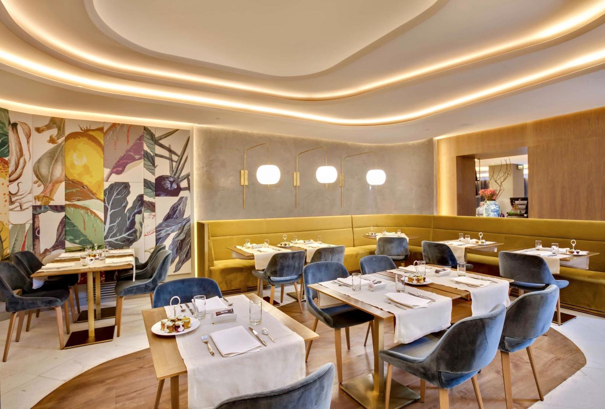 Hotel Barcelo Emperatriz Madrid Esterno foto Restaurant